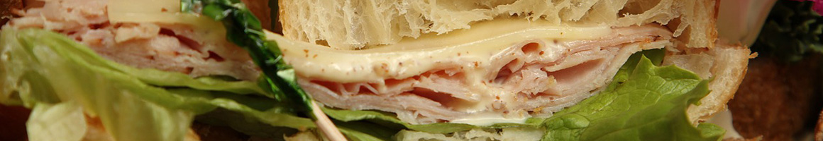 Eating Sandwich Cheesesteak at Philly Corner restaurant in Charlotte, NC.